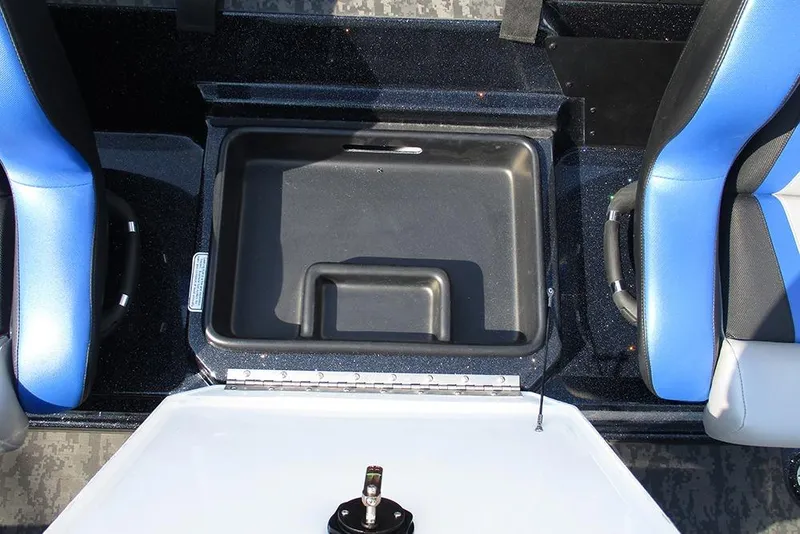 Slide: The Image of 2026 Nitro Z21 XL Pro boat interior with storage compartment and blue seats. - 21