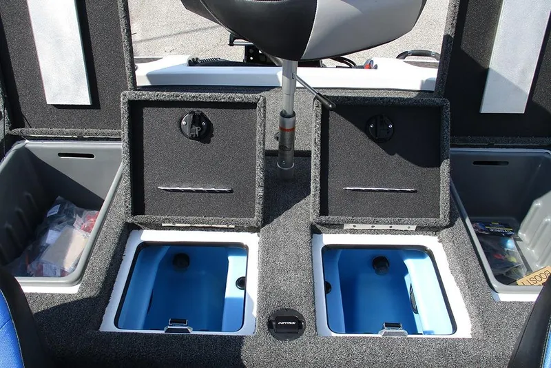Slide: The Image of 2026 Nitro Z21 XL Pro boat interior with storage compartments and seating. - 23