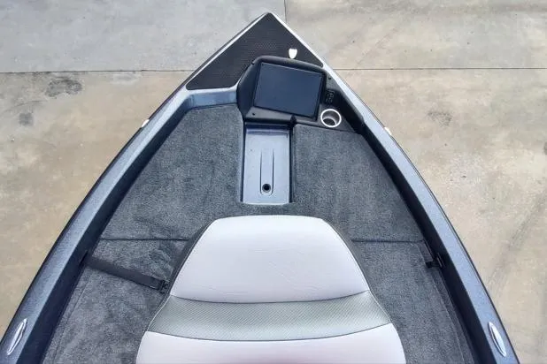 Slide: The Image of Front deck of 2026 Phoenix 818 Pro boat with seat and control panel. - 3