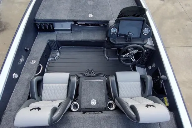 Slide: The Image of 2026 Phoenix 818 Pro boat interior with dual seats, steering console, and modern dashboard. - 7
