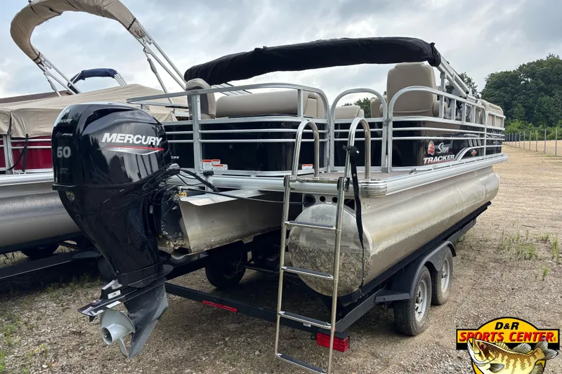 Slide: The Image of 2023 Sun Tracker SportFish 20 DLX pontoon boat with Mercury 60 engine on trailer. - 3