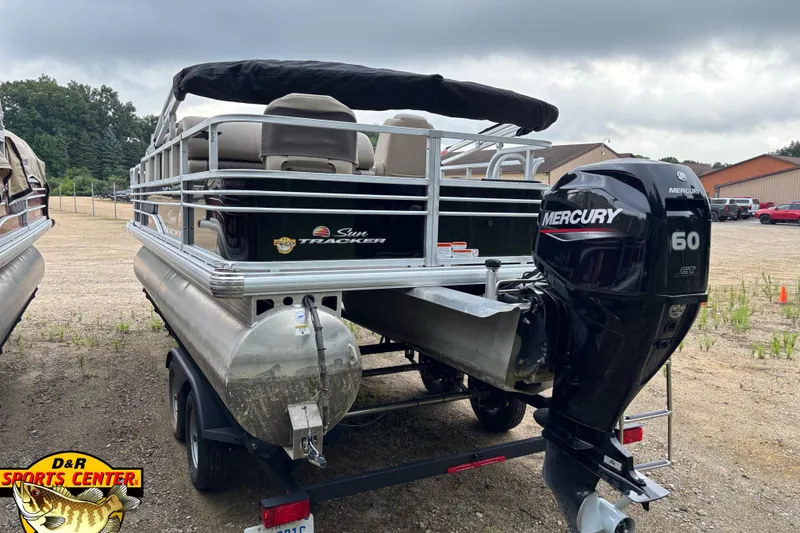 Slide: The Image of 2023 Sun Tracker SportFish 20 DLX pontoon boat with Mercury 60 outboard motor. - 4