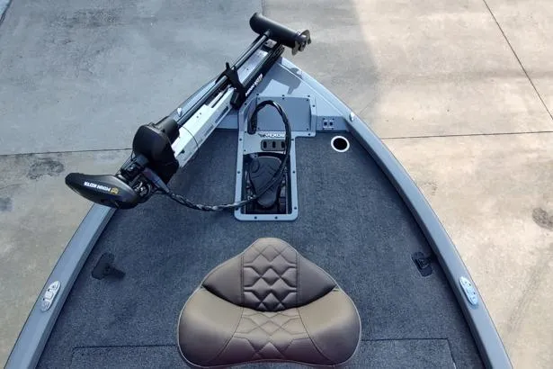 Slide: The Image of 2026 Vexus AVX1980 boat deck with trolling motor and cushioned seat. - 3