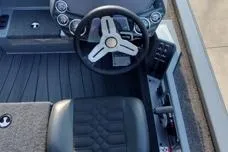 Slide: The Image of 2026 Vexus AVX1980 boat cockpit with steering wheel and dashboard controls. - 6