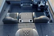 Slide: The Image of 2026 Vexus AVX1980 boat interior with seating and steering wheel. - 8