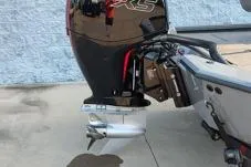 Slide: The Image of 2026 Vexus AVX1980 boat motor, close-up view, parked on concrete surface. - 9