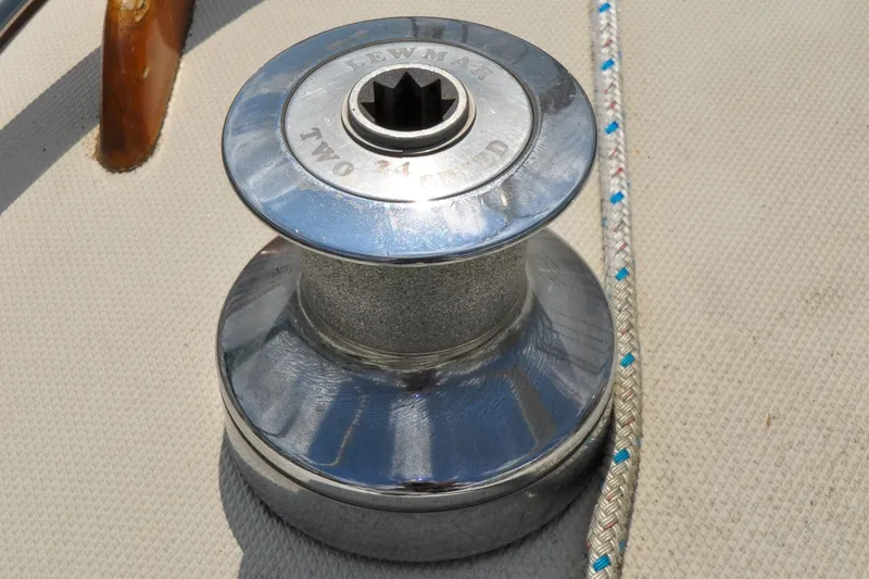 Slide: The Image of Chrome winch on 1984 Sabre 38 MKI sailboat deck with rope. - 16