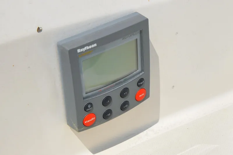Slide: The Image of Raytheon autopilot control panel on 1984 Sabre 38 MKI sailboat. - 23