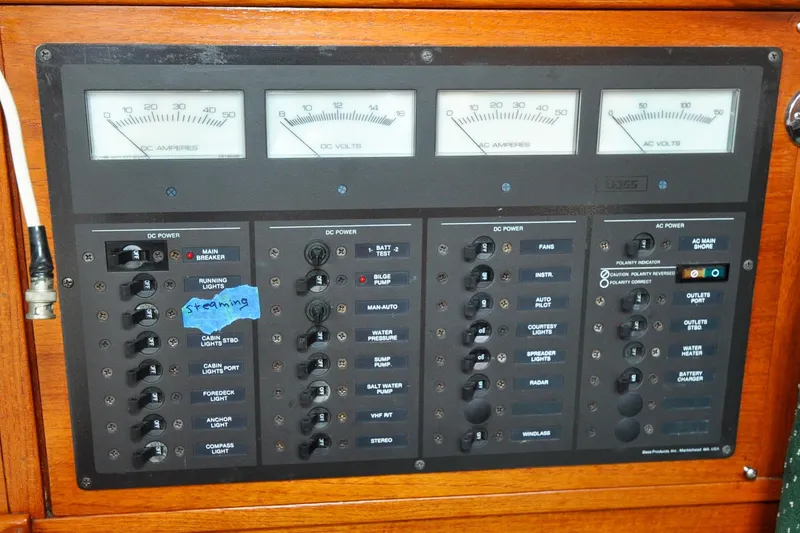 Slide: The Image of Electrical panel of a 1984 Sabre 38 MKI sailboat with gauges and switches. - 39