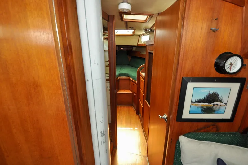 Slide: The Image of Interior of 1984 Sabre 38 MKI sailboat with wood paneling and cozy cabin. - 47