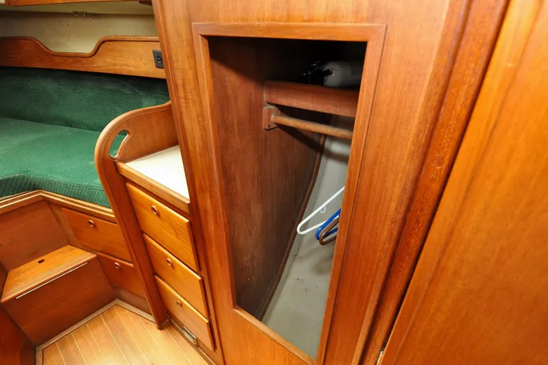 Slide: The Image of Wooden interior of 1984 Sabre 38 MKI sailboat with closet and drawers. - 51