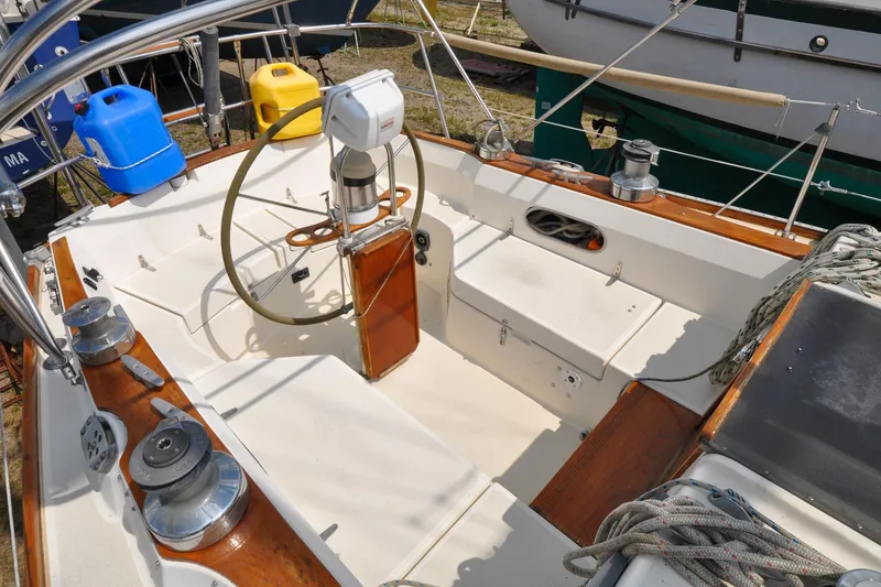 Slide: The Image of Cockpit of 1984 Sabre 38 MKI sailboat with steering wheel and winches. - 8