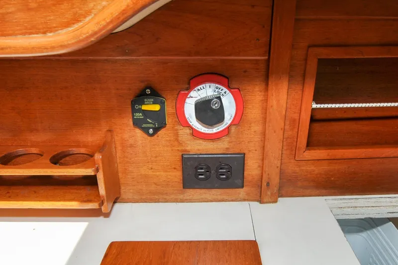 Slide: The Image of Interior of 1984 Sabre 38 MKI sailboat showing electrical panel and wood finish. - 81