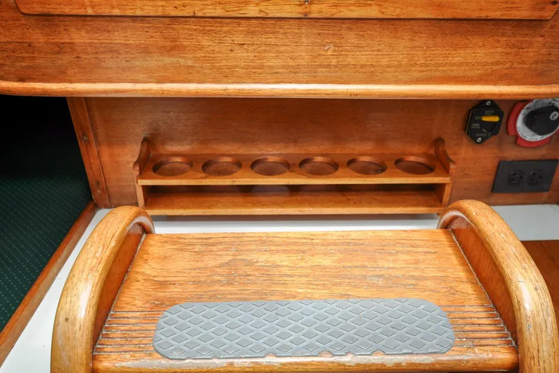 Slide: The Image of 1984 Sabre 38 MKI interior with wooden steps and cup holders. - 82