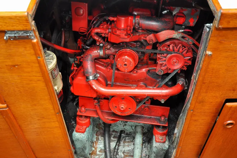 Slide: The Image of 1984 Sabre 38 MKI engine compartment with red-painted engine components. - 85