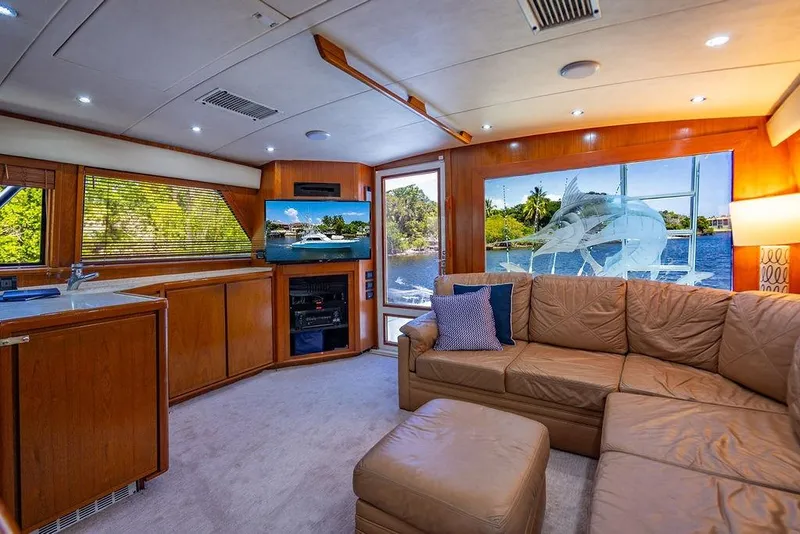 Slide: The Image of Luxurious interior of a 1998 Bertram Convertible yacht with leather seating and modern amenities. - 39
