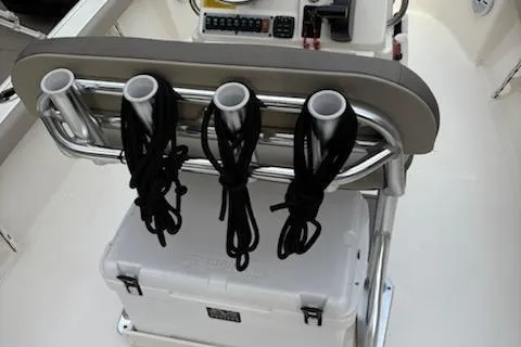 Slide: The Image of 2009 Key West 188 Bay Reef boat with rod holders and cooler. - 8