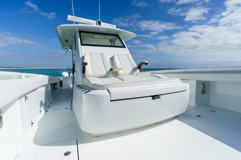 Slide: The Image of 2021 Barker Boatworks 40 HPC with luxurious seating on open water. - 10