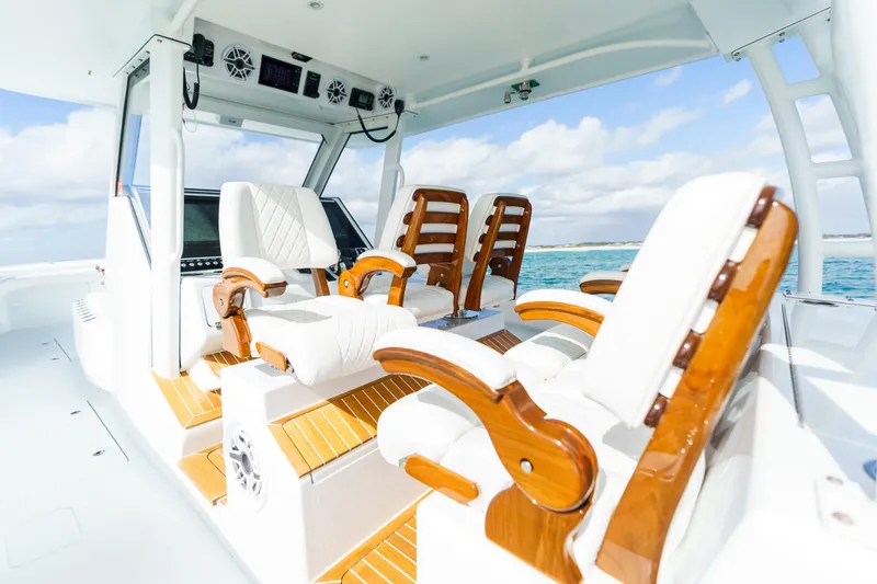 Slide: The Image of 2021 Barker Boatworks 40 HPC interior with luxurious seating and ocean view. - 14