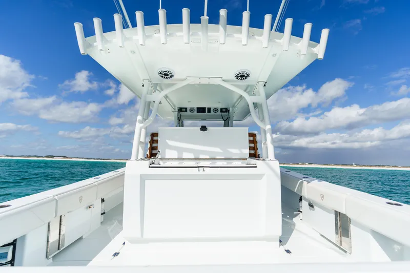 Slide: The Image of 2021 Barker Boatworks 40 HPC on open water under blue sky. - 18