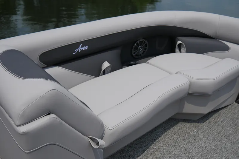Slide: The Image of 2025 Barletta ARIA 22QC boat interior with luxurious seating and speaker system. - 5