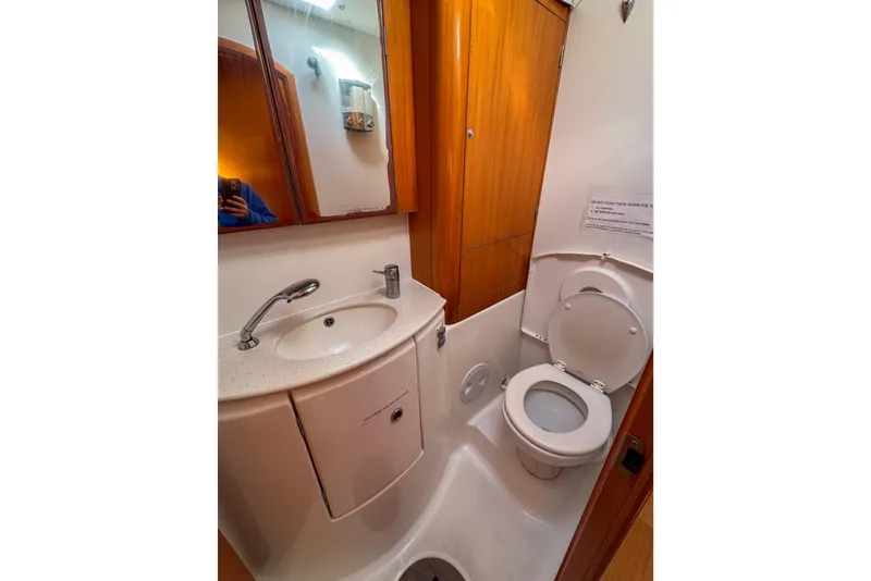 Slide: The Image of Bathroom interior of 2005 Lagoon 440 yacht with sink and toilet. - 42
