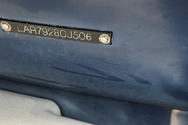 Slide: The Image of Hull identification number on 2006 Larson 3700 Cabrio boat, LAR79280J506. - 21