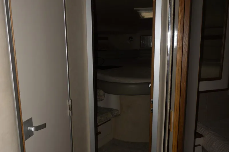 Slide: The Image of Interior cabin view of a 1993 Sea Ray 400 Express Cruiser yacht. - 28