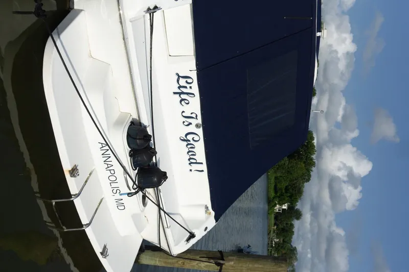 Slide: The Image of 1993 Sea Ray 400 Express Cruiser docked in Annapolis, MD, with "Life Is Good!" text. - 6