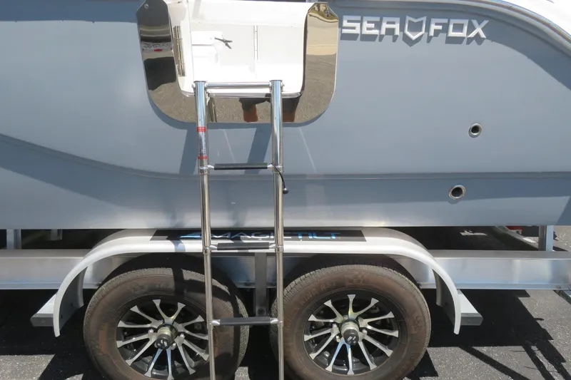 Slide: The Image of Sea Fox 268 Commander boat on trailer with ladder, Sarasota, FL, 2025 model. - 2