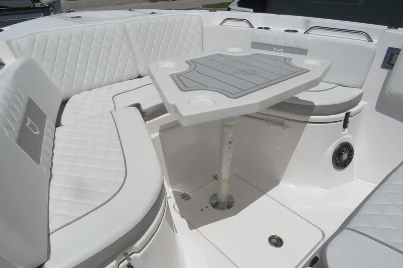 Slide: The Image of Luxurious seating area on 2025 Sea Fox 268 Commander boat, featuring elegant white upholstery. - 24