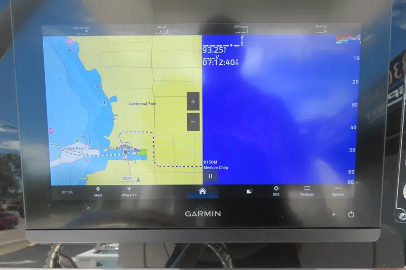 Slide: The Image of Garmin marine GPS display on Sea Fox 268 Commander, showing Sarasota navigation map. - 32