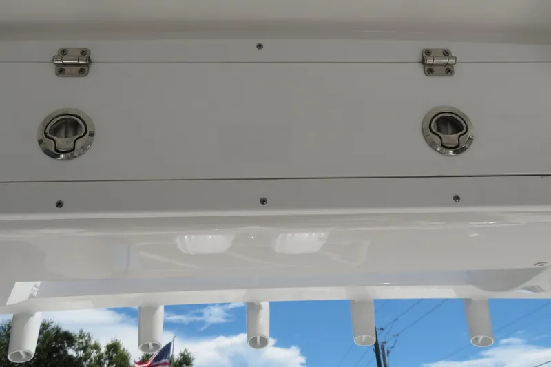 Slide: The Image of 2025 Sea Fox 268 Commander boat storage compartment with rod holders, Sarasota, FL. - 38