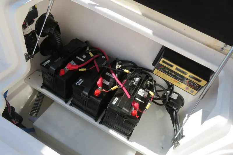 Slide: The Image of Battery compartment of 2025 Sea Fox 268 Commander boat, featuring marine batteries and wiring. - 42
