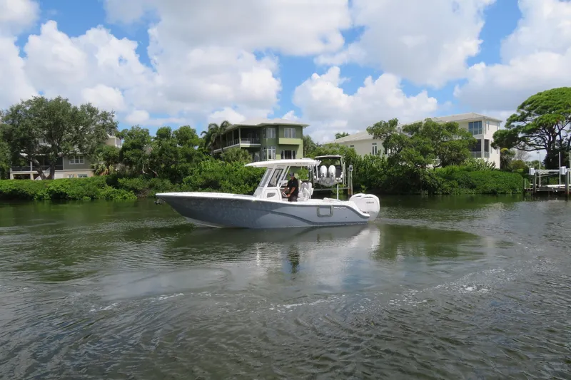 Slide: The Image of 2025 Sea Fox 268 Commander boat cruising in Sarasota, FL, with twin Yamaha F200 engines. - 48
