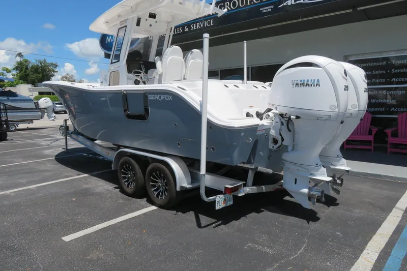 Slide: The Image of 2025 Sea Fox 268 Commander with twin Yamaha F200 engines, parked in Sarasota, FL. - 9