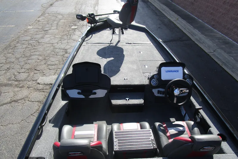Slide: The Image of 2025 Ranger RT 198 P boat interior with steering console and seating. - 15
