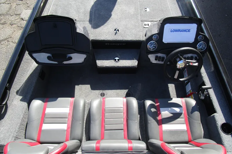 Slide: The Image of 2025 Ranger RT 198 P boat interior with dual seats and modern dashboard. - 9