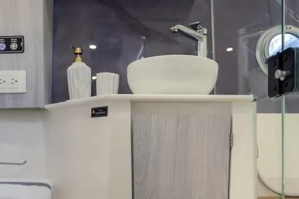 Slide: The Image of Luxurious bathroom interior of 2025 Hanover 387 Classic Luxury Edition yacht. - 13