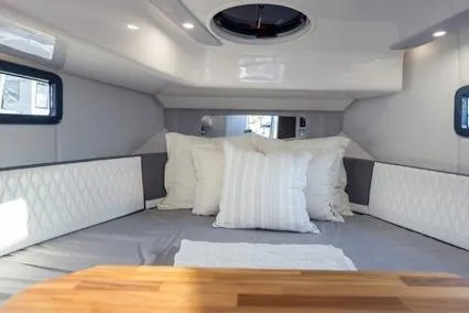 Slide: The Image of Luxurious interior of 2025 Hanover 387 Classic, featuring elegant bedding and modern design. - 9