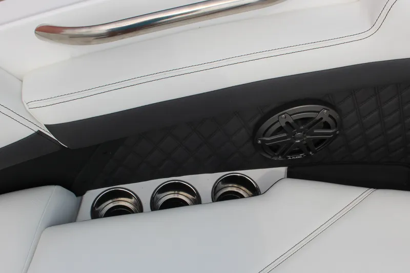 Slide: The Image of Interior of 2025 Cobalt R4 Surf boat with speaker and cup holders. - 29