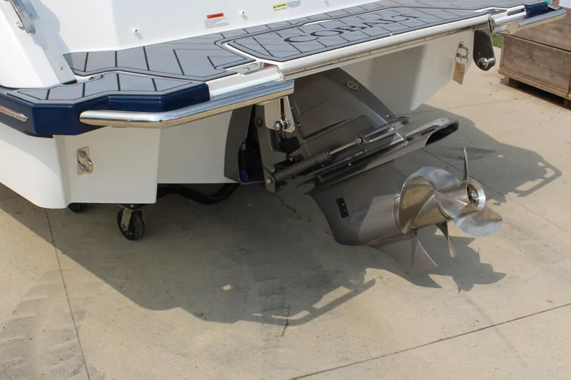 Slide: The Image of 2025 Cobalt R4 Surf boat with stainless steel propeller and swim platform. - 4