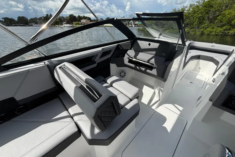 Slide: The Image of 2026 Cobalt R4 Outboard boat interior with sleek seating and modern dashboard design. - 7