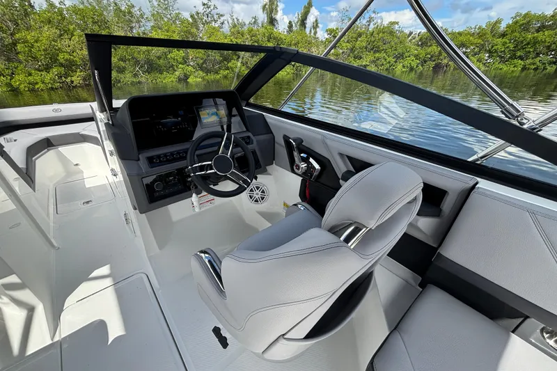 Slide: The Image of 2026 Cobalt R4 Outboard boat interior with sleek design and modern controls. - 8