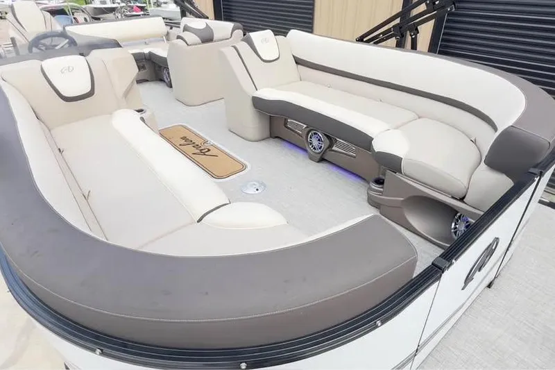 Slide: The Image of 2024 Avalon LSV 2585 pontoon boat with luxurious seating and modern design. - 5