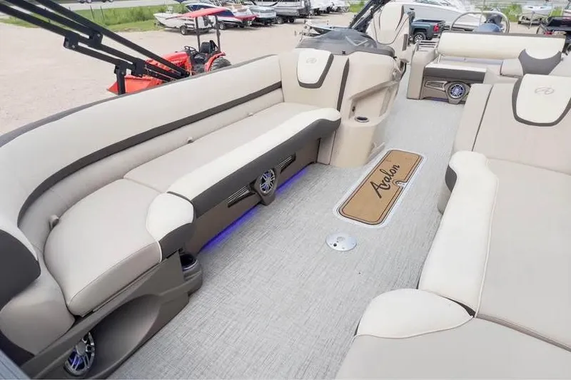 Slide: The Image of Luxurious interior of 2024 Avalon LSV 2585 pontoon boat with plush seating. - 6