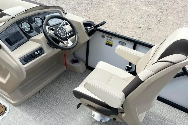 Slide: The Image of 2024 Avalon LSV 2585 boat cockpit with modern steering and comfortable seating. - 8