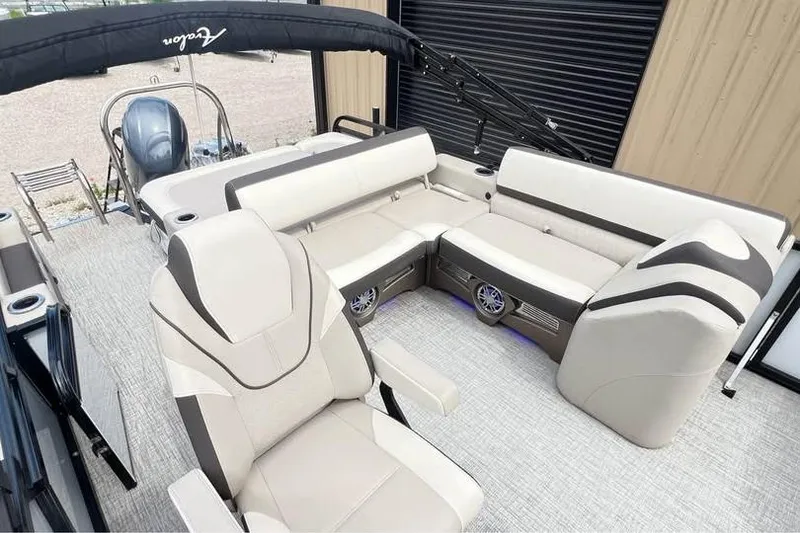 Slide: The Image of 2024 Avalon LSV 2585 boat interior with luxurious seating and modern design. - 9