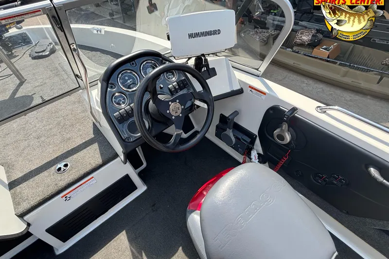 Slide: The Image of 2007 Ranger 1760 Angler boat interior with steering wheel and Humminbird fish finder. - 10