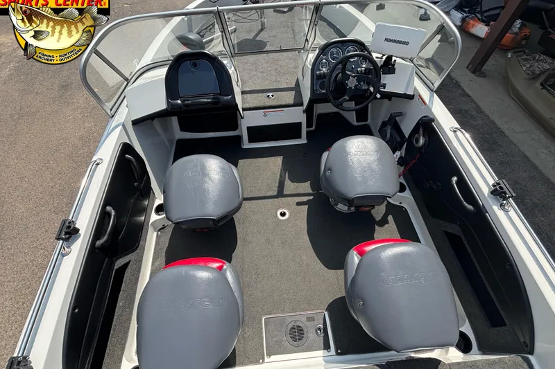 Slide: The Image of 2007 Ranger 1760 Angler boat interior with steering console and seating. - 6